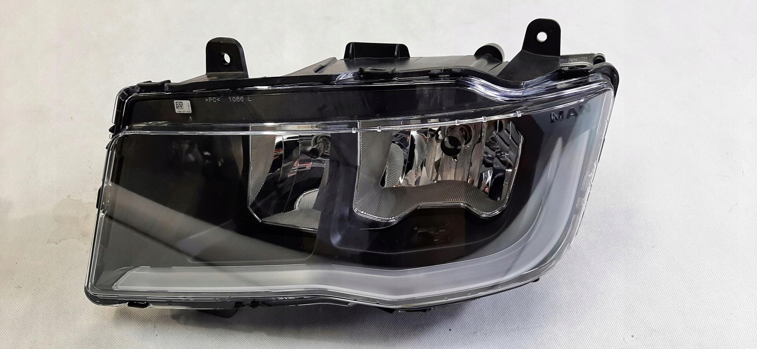 MAN TGX REFLEKTOR LAMPA LEWY PRZÓD 81251016835