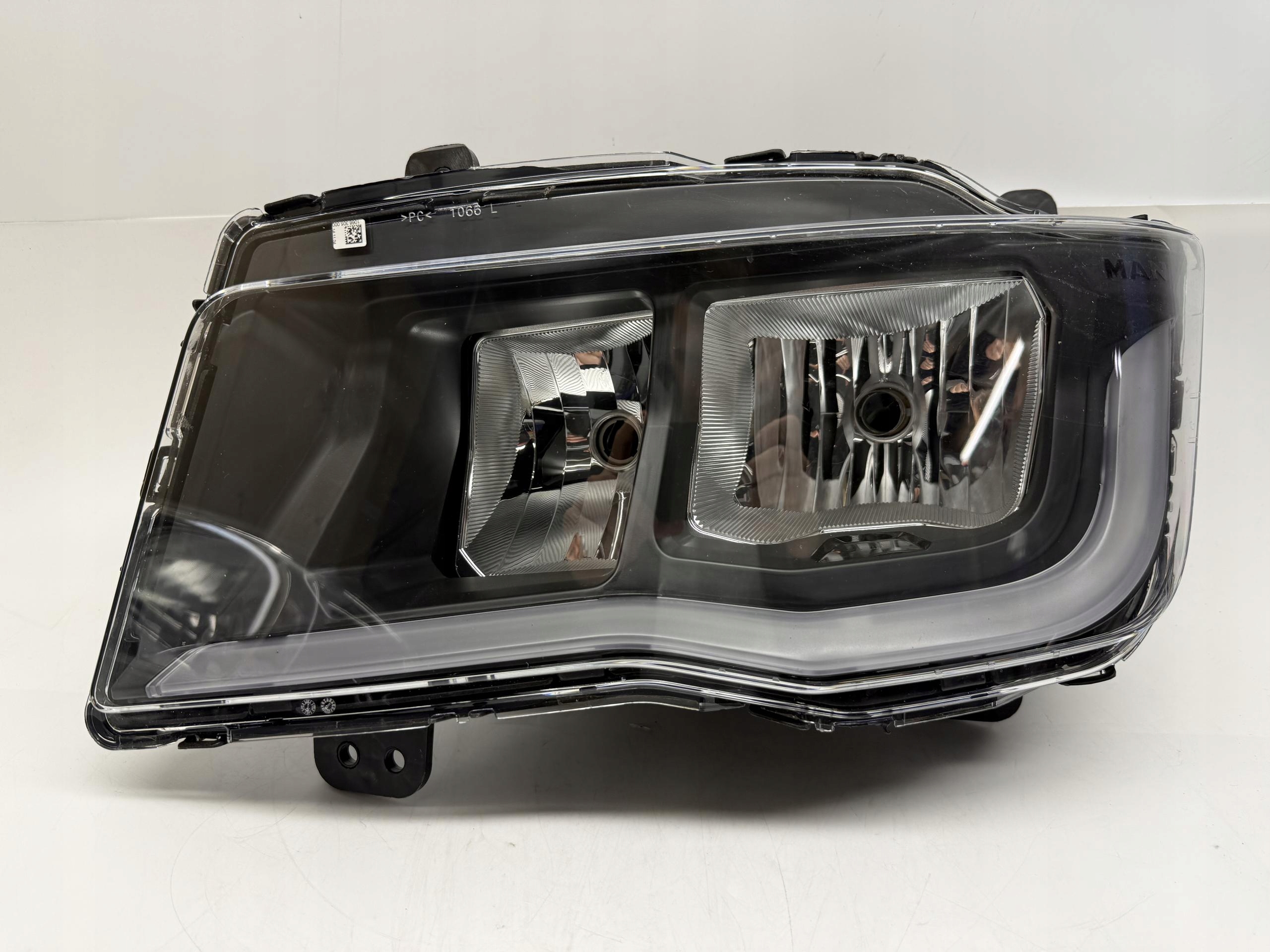 MAN TGX REFLEKTOR LAMPA LEWY PRZÓD 81251016737