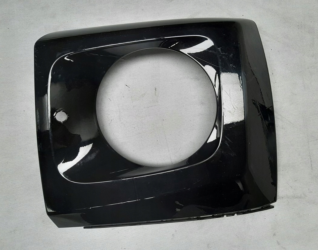 Mercedes G W463 Ramka lampy lewa A4638804102 MASKOWNICA