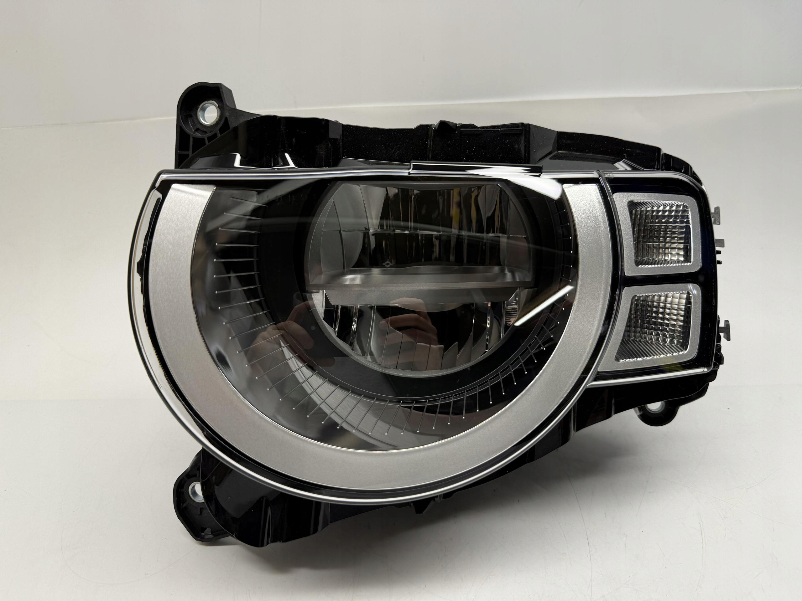 LAND ROVER DEFENDER II L663 REFLEKTOR LAMPA LEWY PRZÓD LED L8B213W030BF