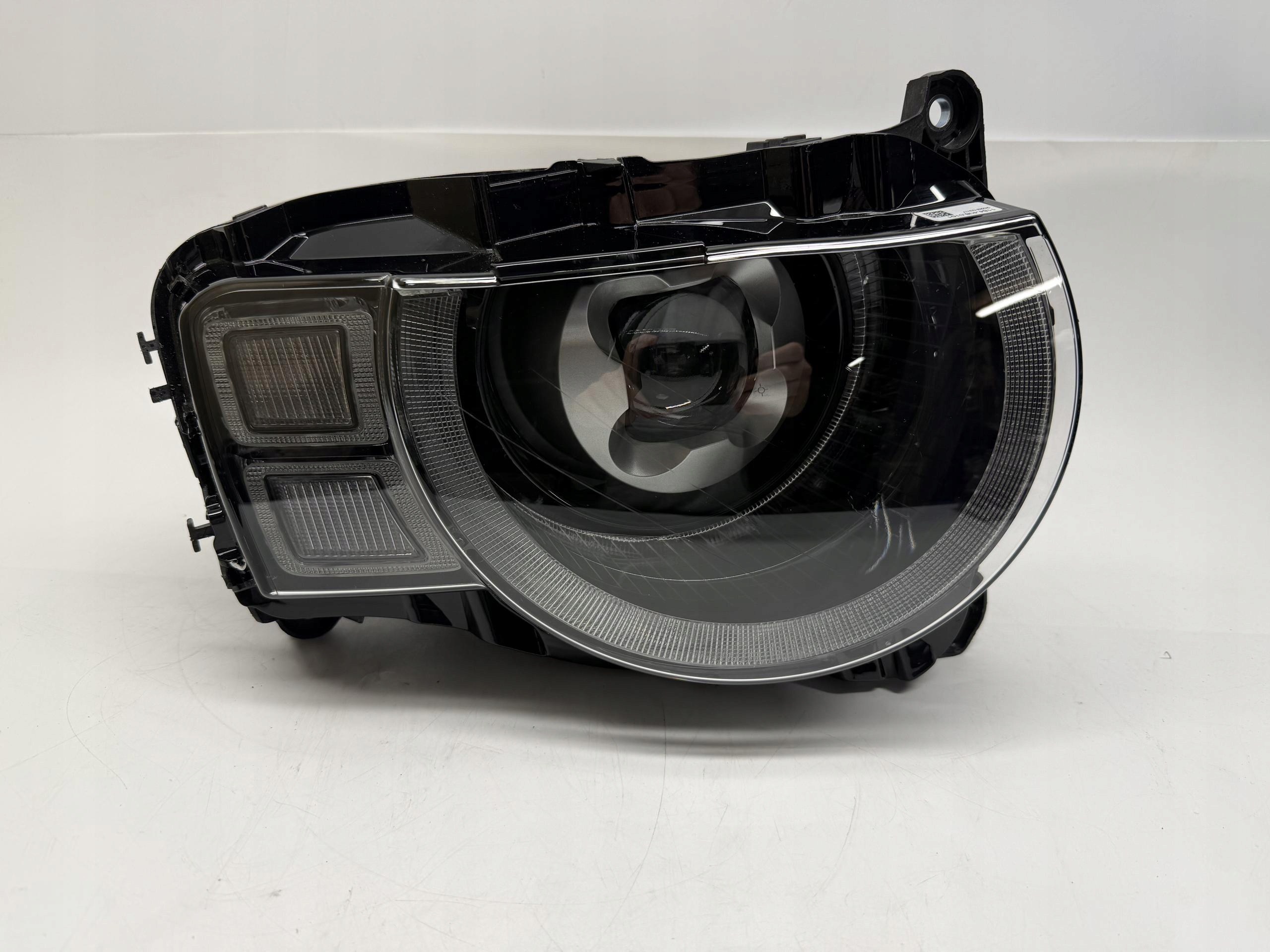 LAND ROVER DEFENDER II L663 REFLEKTOR LAMPA LEWY PRZÓD LED L8B213W029FF