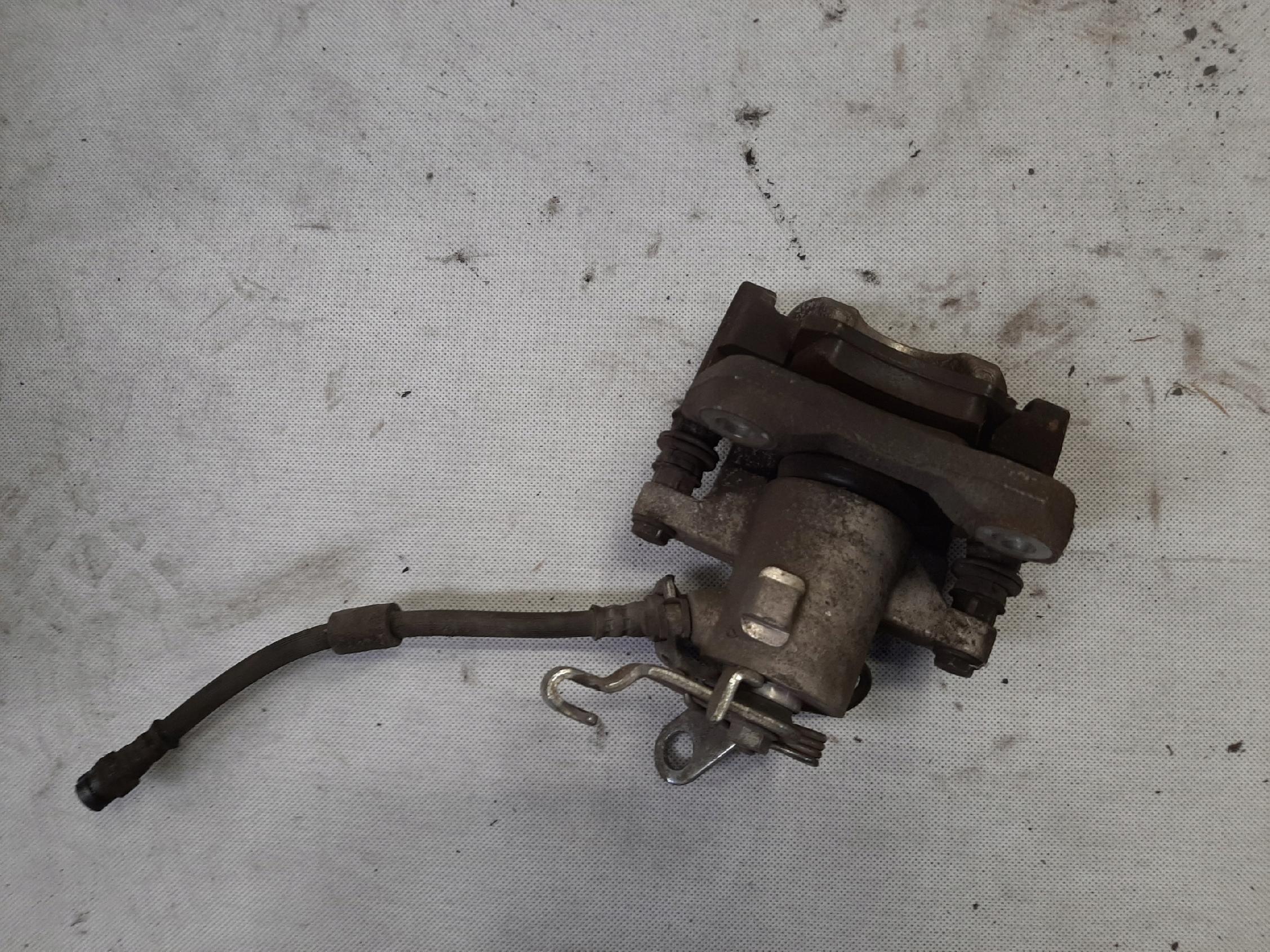 VW JETTA VI ZACISK HAMULCOWY PRAWY TYŁ TYLY 1K0615424J - obrazek 2